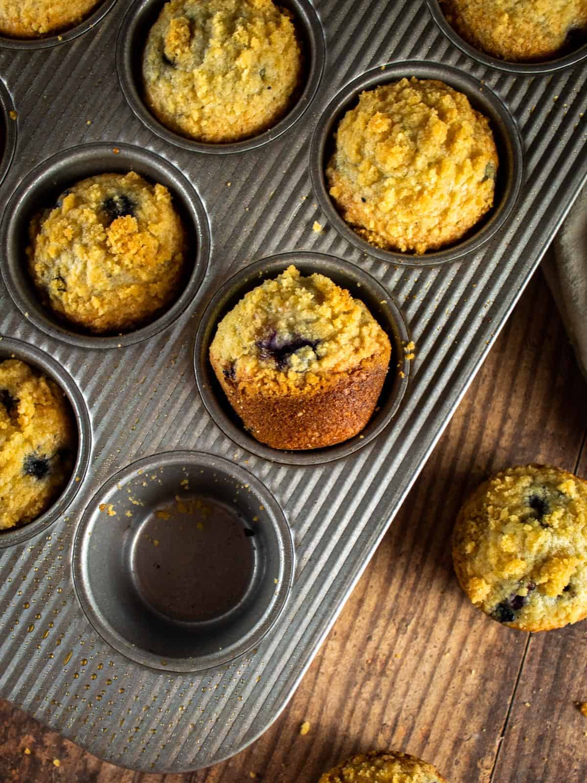 pan of baked blueberry streusel muffins