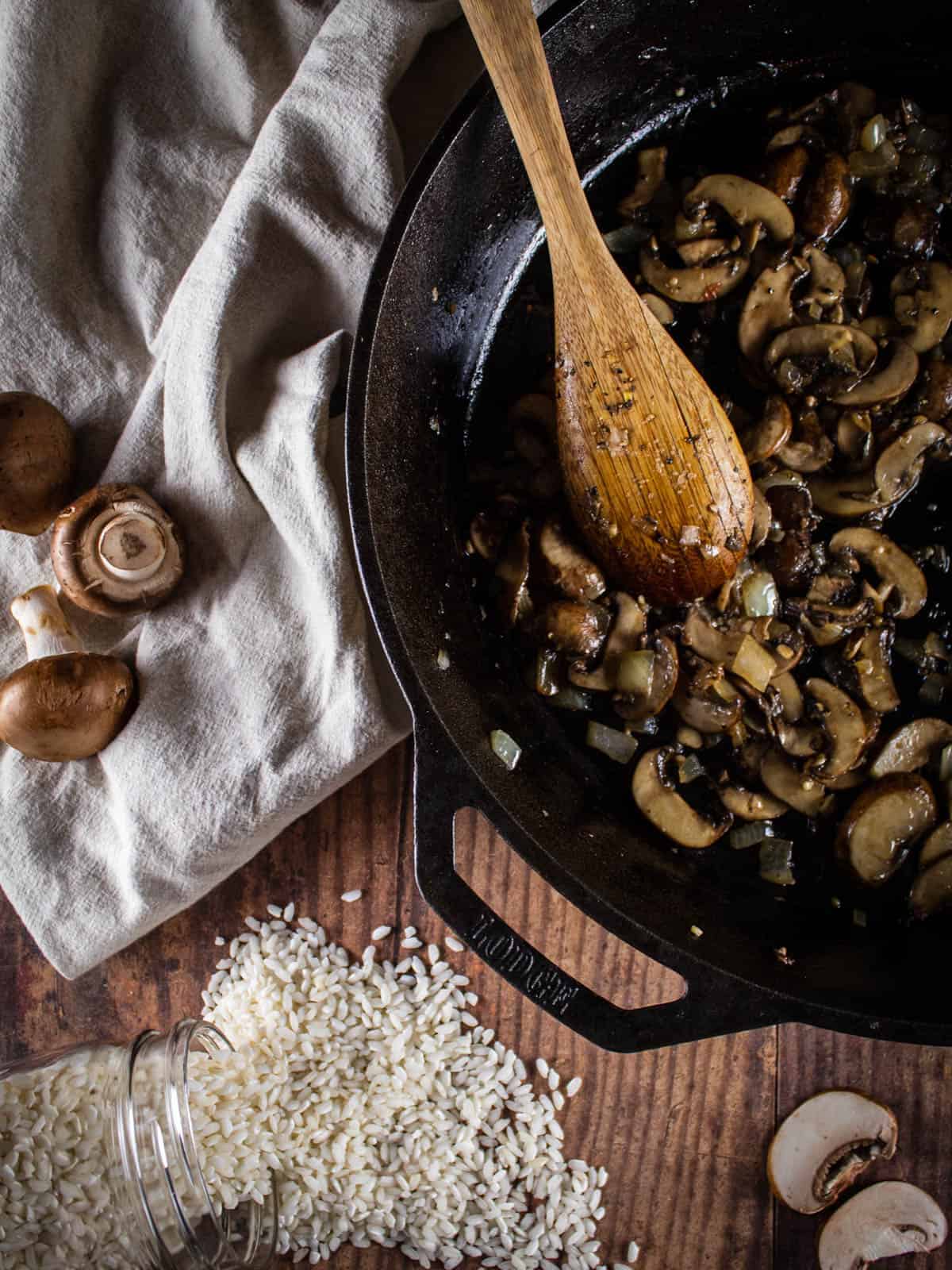 sauteed mushrooms, onions and garlic in a cast iron skillet
