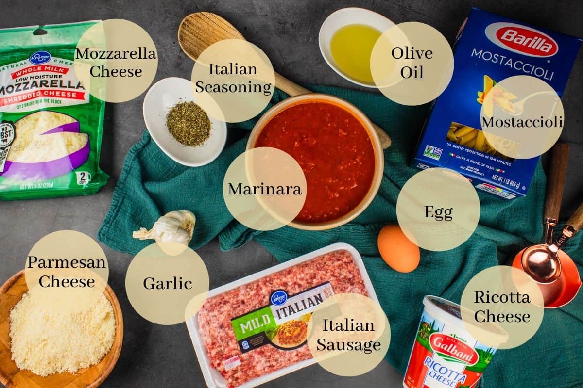 shredded mozzarella, garlic, italian seasoning, marinara, parmesan, italian sausage, ricotta, egg, mostaccioli pasta and olive oil 
