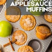 cinnamon applesauce muffins in a muffin tin with green apples around.