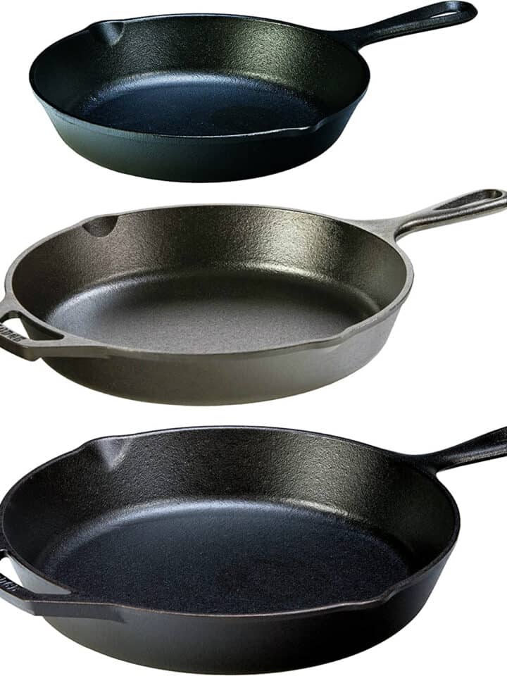 three black cast iron skillets.