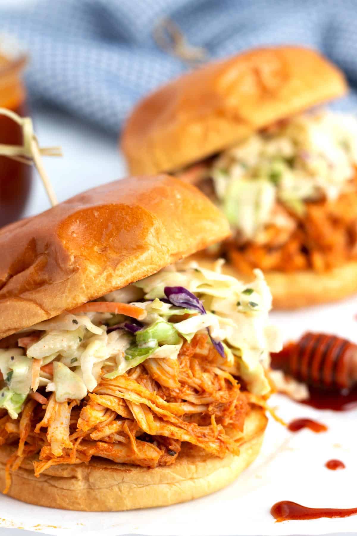 shredded chicken sandwiches with coleslaw.