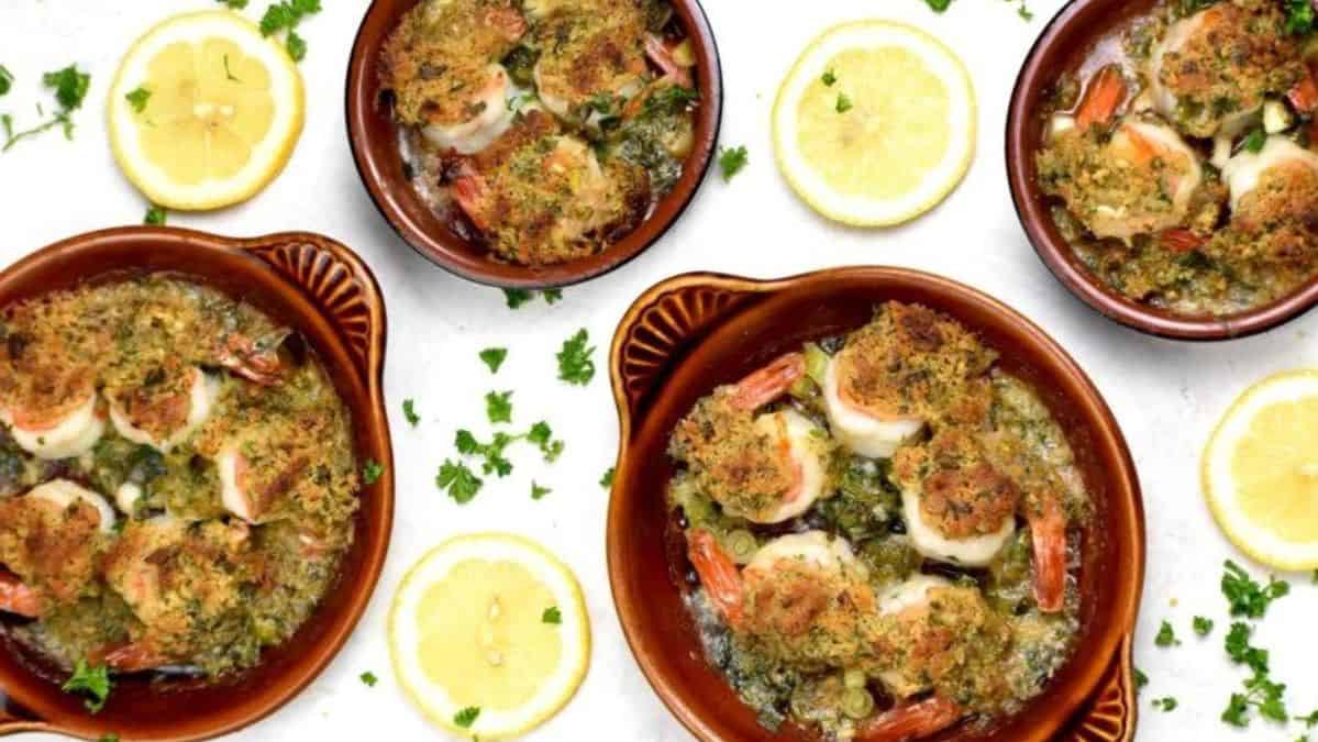 baked shrimp in small circle dishes.