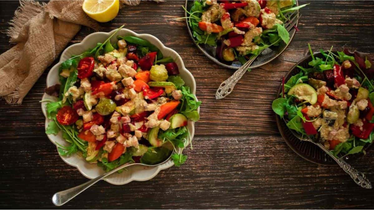 Salad and a bowl, vegetables and greens.