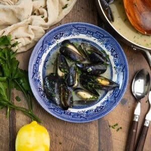 A bowl of garlic butter mussels.